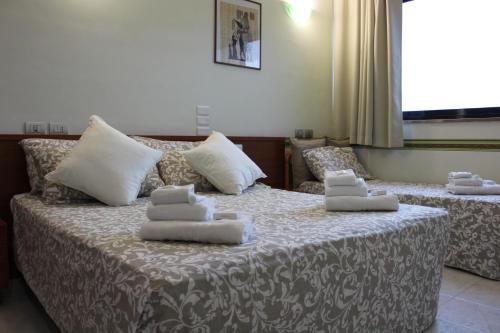 Letto o letti in una camera di Hotel Cristallo Relais, Sure Hotel Collection By Best Western