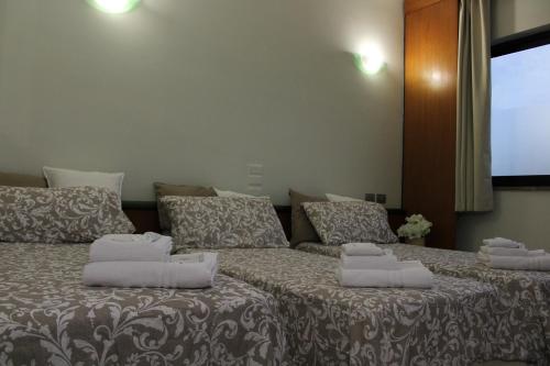 Letto o letti in una camera di Hotel Cristallo Relais, Sure Hotel Collection By Best Western