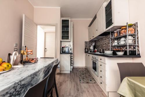 Η κουζίνα ή μικρή κουζίνα στο B&B DE CASA