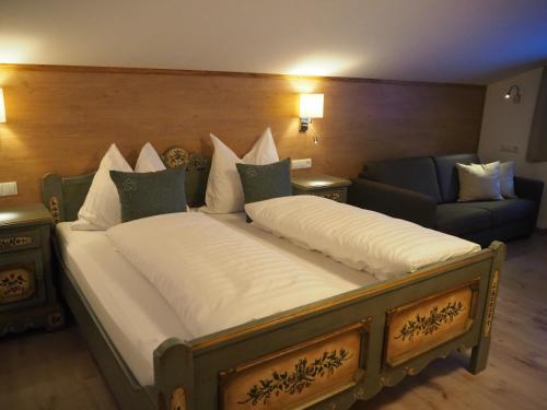 Un ou plusieurs lits dans un hébergement de l'établissement Haus Florian Appartements