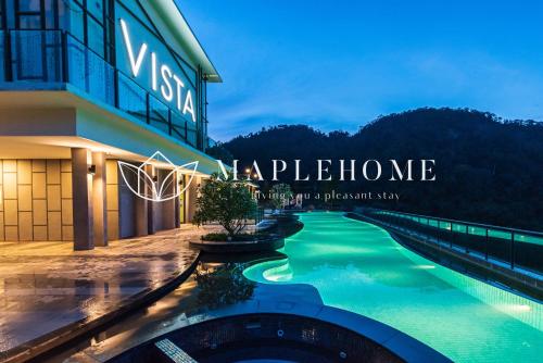 Vista Premier Suites Genting Highlands في مرتفعات جنتنغ: اطلالة الفندق على المسبح