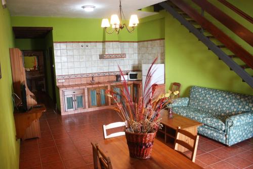 A kitchen or kitchenette at Apartamentos Trinidad