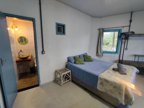 Postel nebo postele na pokoji v ubytování Casa de Frente para o Mar em Manguinhos