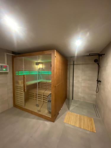 a room with a closet with a bed in it at Istebna Pełna Chata II in Istebna