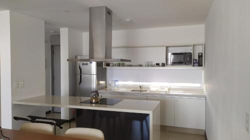 Dapur atau dapur kecil di Apto Balcón Vista al Río Nª 402, Colonia del Sacramento