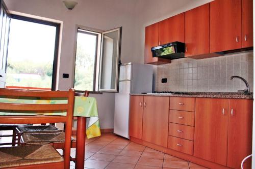 Kuchyň nebo kuchyňský kout v ubytování Case Vacanze Pietragrande