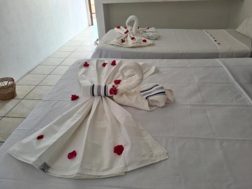 Cama o camas de una habitación en Pousada Brilho da Lua
