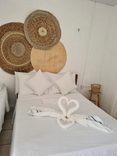 Cama o camas de una habitación en Pousada Brilho da Lua