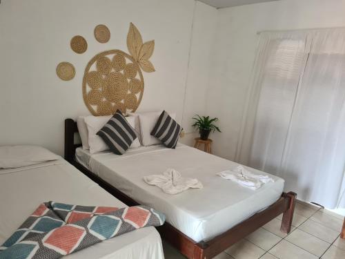 Cama o camas de una habitación en Pousada Brilho da Lua