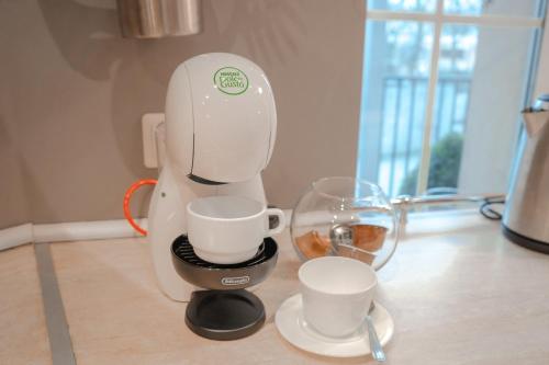Kemudahan buat kopi dan teh di Alpetri Apartments