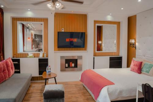 Katil atau katil-katil dalam bilik di Alpetri Apartments