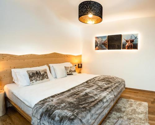 Ένα ή περισσότερα κρεβάτια σε δωμάτιο στο Apartments Rainer - Val Gardena