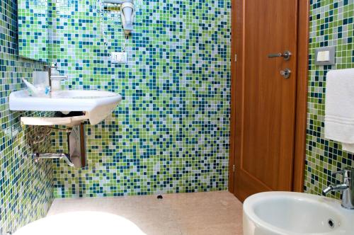 Kylpyhuone majoituspaikassa Le Saline Hotel