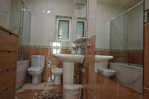 Koupelna v ubytování Apartmani BOBO