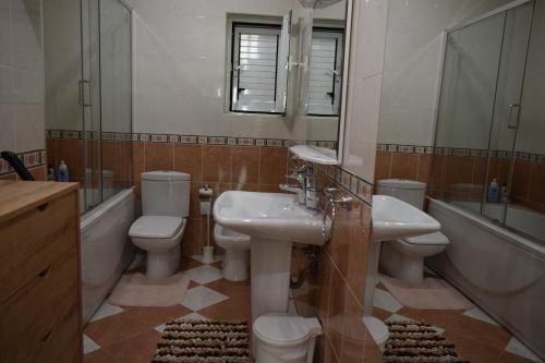 Koupelna v ubytování Apartmani BOBO