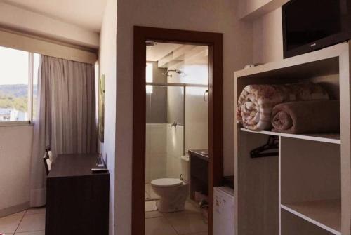 Koupelna v ubytování Hotel Comoditá Ltda