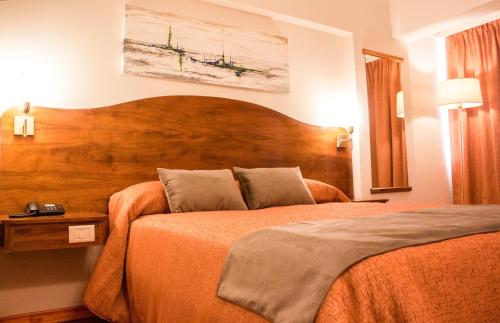 Letto o letti in una camera di HOTEL ROYAL PRINCESS