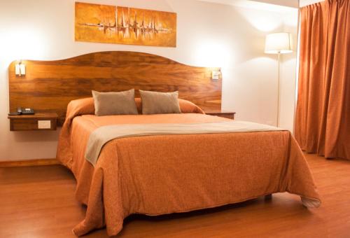 Letto o letti in una camera di HOTEL ROYAL PRINCESS