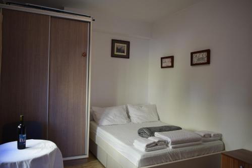 Postel nebo postele na pokoji v ubytování Apartmani BOBO