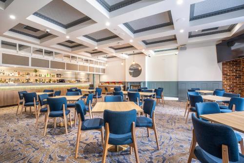 Un restaurante u otro lugar para comer en Nightelier Carrum Downs Sands Hotel