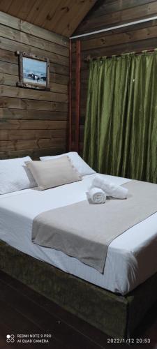 Cama o camas de una habitación en Cabañas Bry