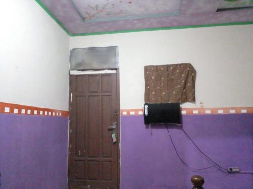 Televisyen dan/atau pusat hiburan di Hotel Alifah 1 Syariah