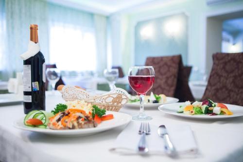 a plate of food on a table at Hotel Krasnoyarsk in Krasnoyarsk
