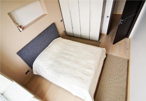 Cama o camas de una habitación en Centr VIP-kvartira by 7