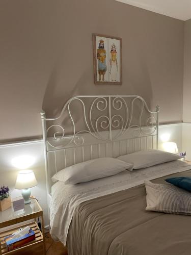 Postel nebo postele na pokoji v ubytování Dimora San Domenico (locazione turistica)