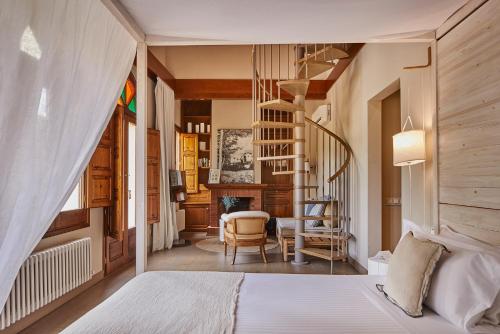 Katil atau katil-katil dalam bilik di Mas Salagros EcoResort & SPA