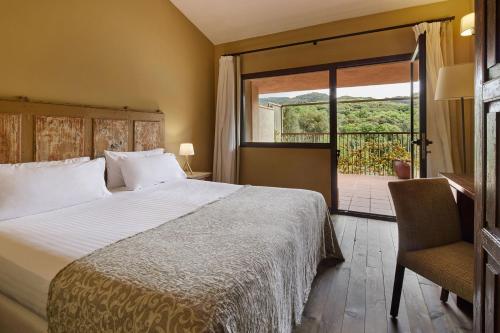 Katil atau katil-katil dalam bilik di Mas Salagros EcoResort & SPA