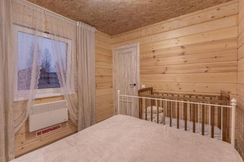 Кровать или кровати в номере Гостевой дом BARN HOUSE