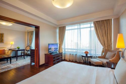 TV o dispositivi per l'intrattenimento presso Beijing Hotel NUO Forbidden City