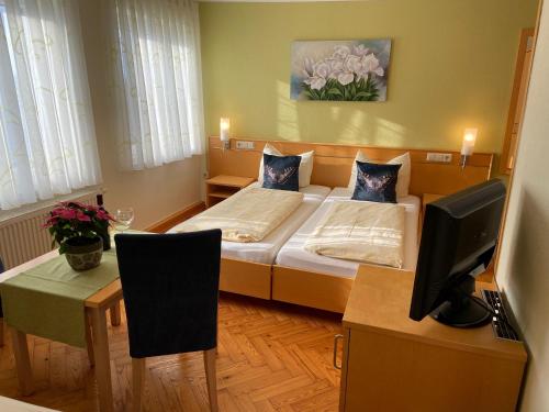 Hotel Goldener Löweにあるベッド