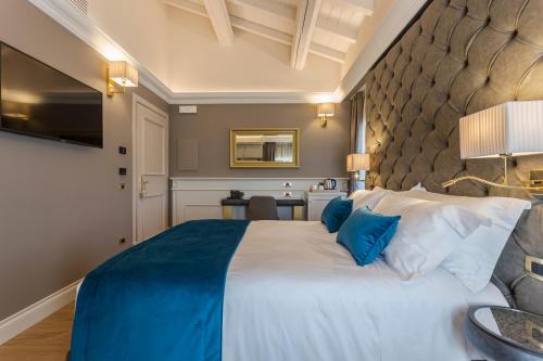Katil atau katil-katil dalam bilik di Boutique Hotel Villa Zoppi - Adults only