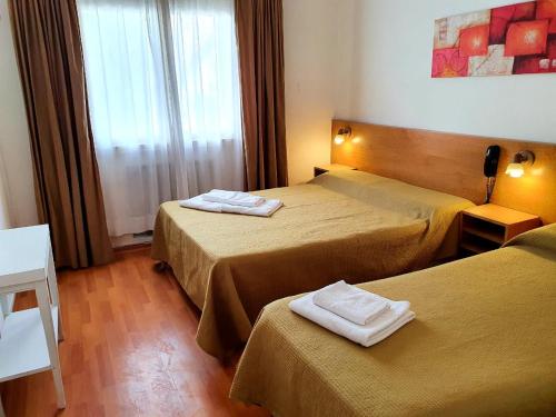 Voodi või voodid majutusasutuse Hotel Mar Azul toas