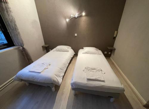 Ένα ή περισσότερα κρεβάτια σε δωμάτιο στο L'Excess Hotel