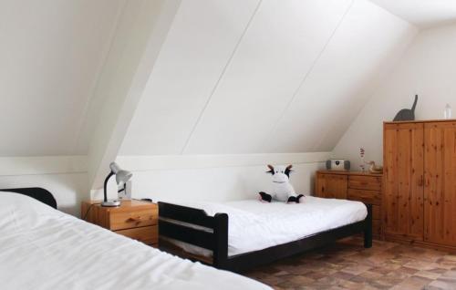 Posteľ alebo postele v izbe v ubytovaní Heerlijk Egmond