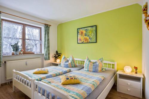 Кровать или кровати в номере Ferienwohnung Lechner