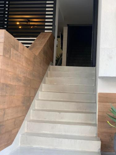 a set of stairs leading up to a house at Hotel 14-04 in Cali