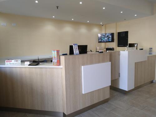 TV a/nebo společenská místnost v ubytování Hotel Villa del Sol