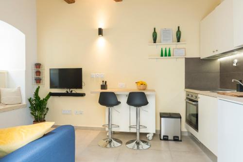 Kuchyň nebo kuchyňský kout v ubytování Authentic GF apartment with terrace at the 3 Cities Marina