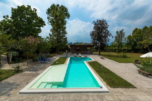an overhead view of a swimming pool in a park at Villa Berrettini in Marano Vicentino