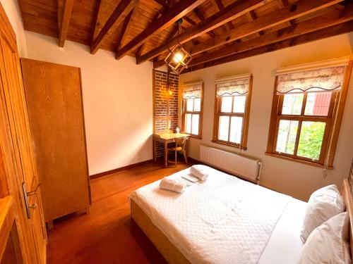 A bed or beds in a room at Authentic Turkish Home Suite
