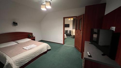 Una cama o camas en una habitación de Willa Larysa Agro