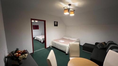 Una cama o camas en una habitación de Willa Larysa Agro