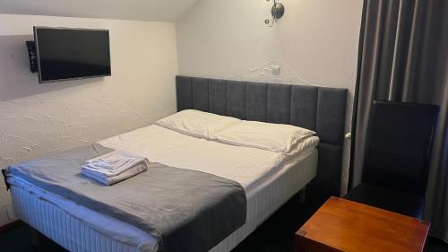 Una cama o camas en una habitación de Willa Larysa Agro