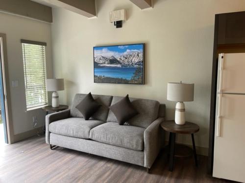 a living room with a couch in a room at Tahoe Trail Resort in Stateline
