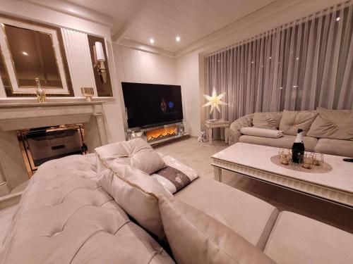 Ruang duduk di Royal Whirlpool Suites Lüneburger Heide