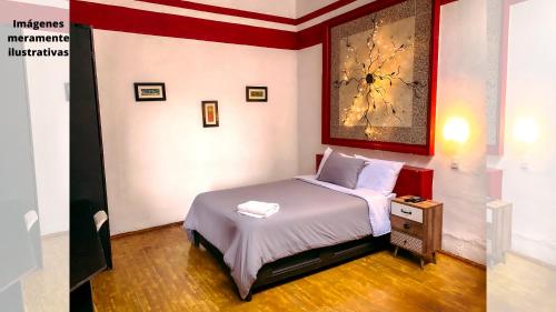 Ένα ή περισσότερα κρεβάτια σε δωμάτιο στο Suites Aldama